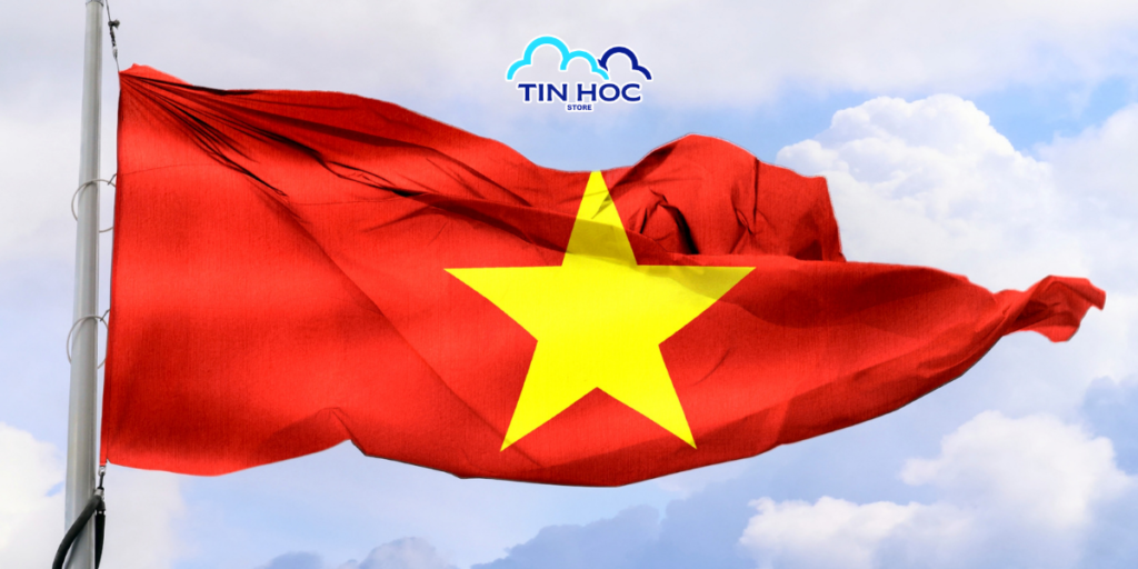 Mẫu background cờ Việt Nam bay phấp phới giữa bầu trời xanh ngắt, biểu tượng cho khát vọng hòa bình và tự do